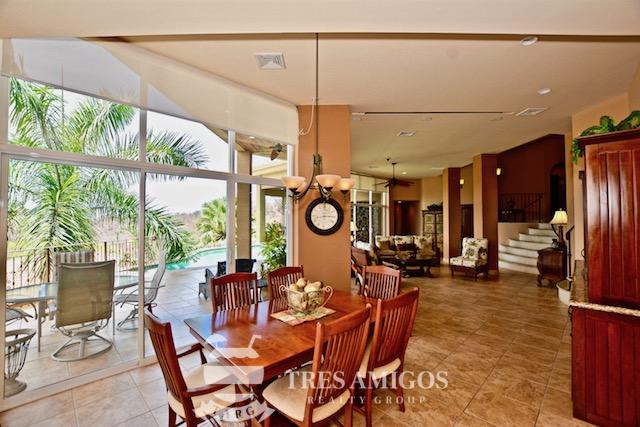 dining area with view to patio and pool