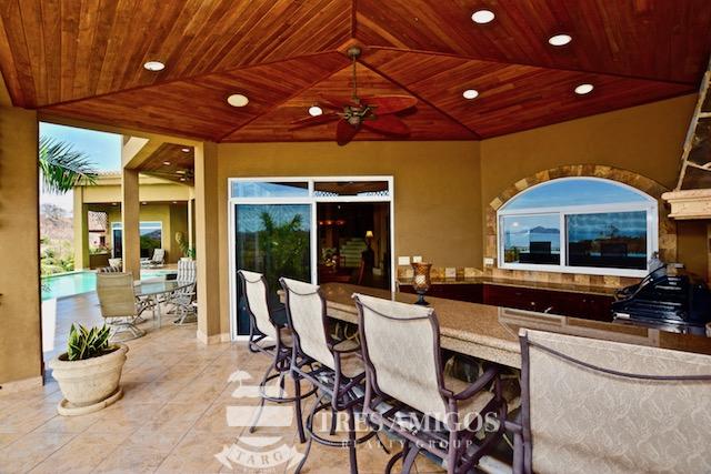 outdoor dining area with BBQ and ceiling fan