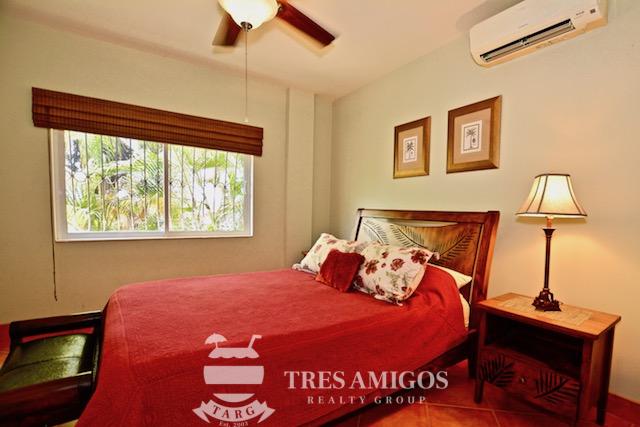 air conditioned bedroom with ceiling fan 